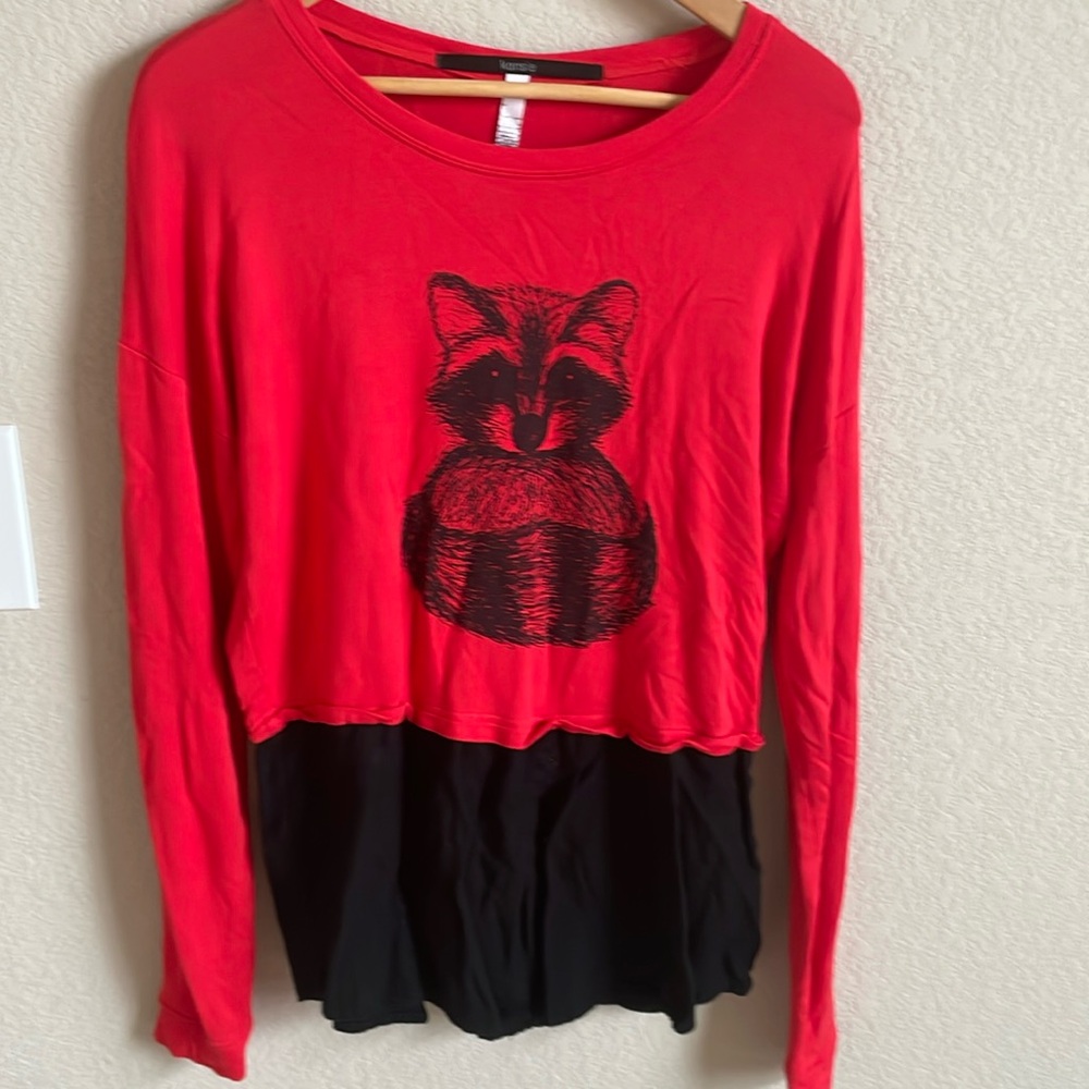 Super Stylish Red Top with Raccoon Picture
Size S